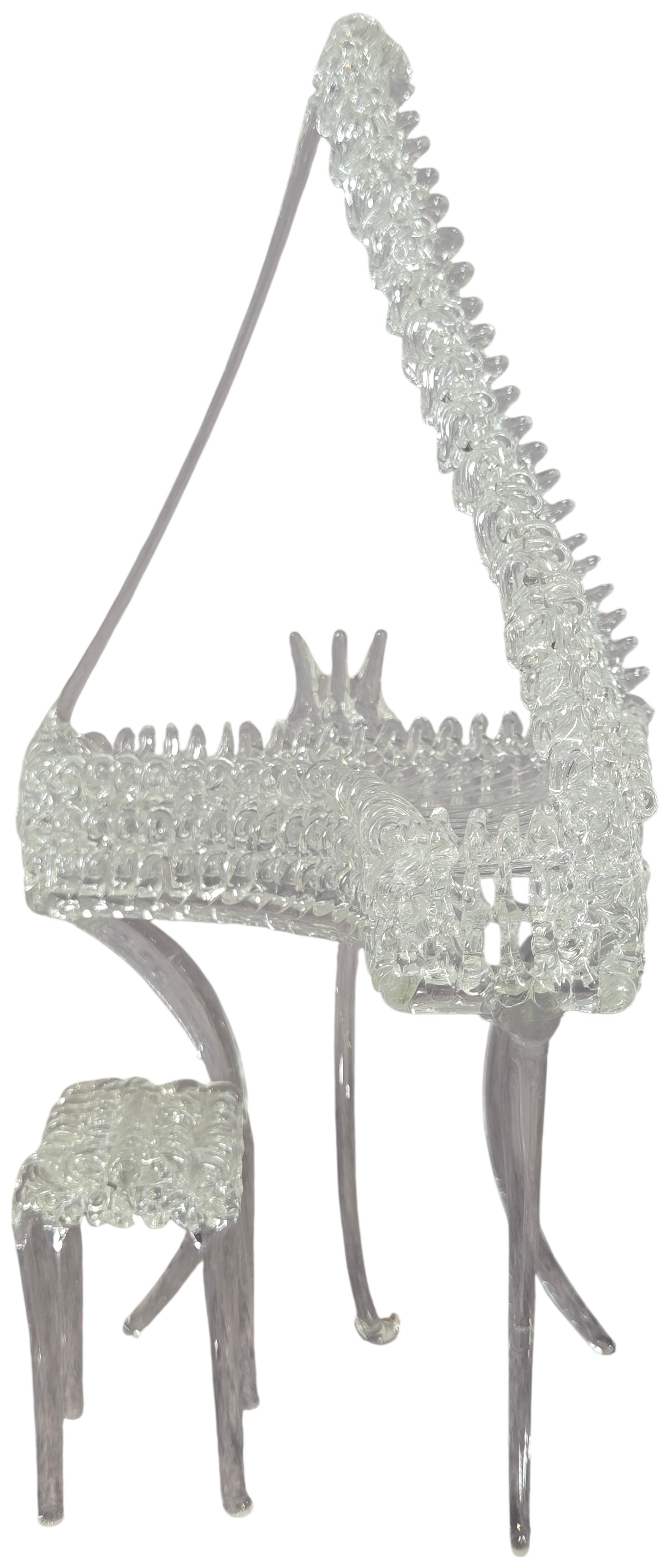 A Pair of Spun Glass Miniature Grand Piano and Stool: This lot consists of a matching miniature set featuring a grand piano and a stool crafted from clear spun glass. The pieces are created using a lampworking technique where fine glass filaments are wov