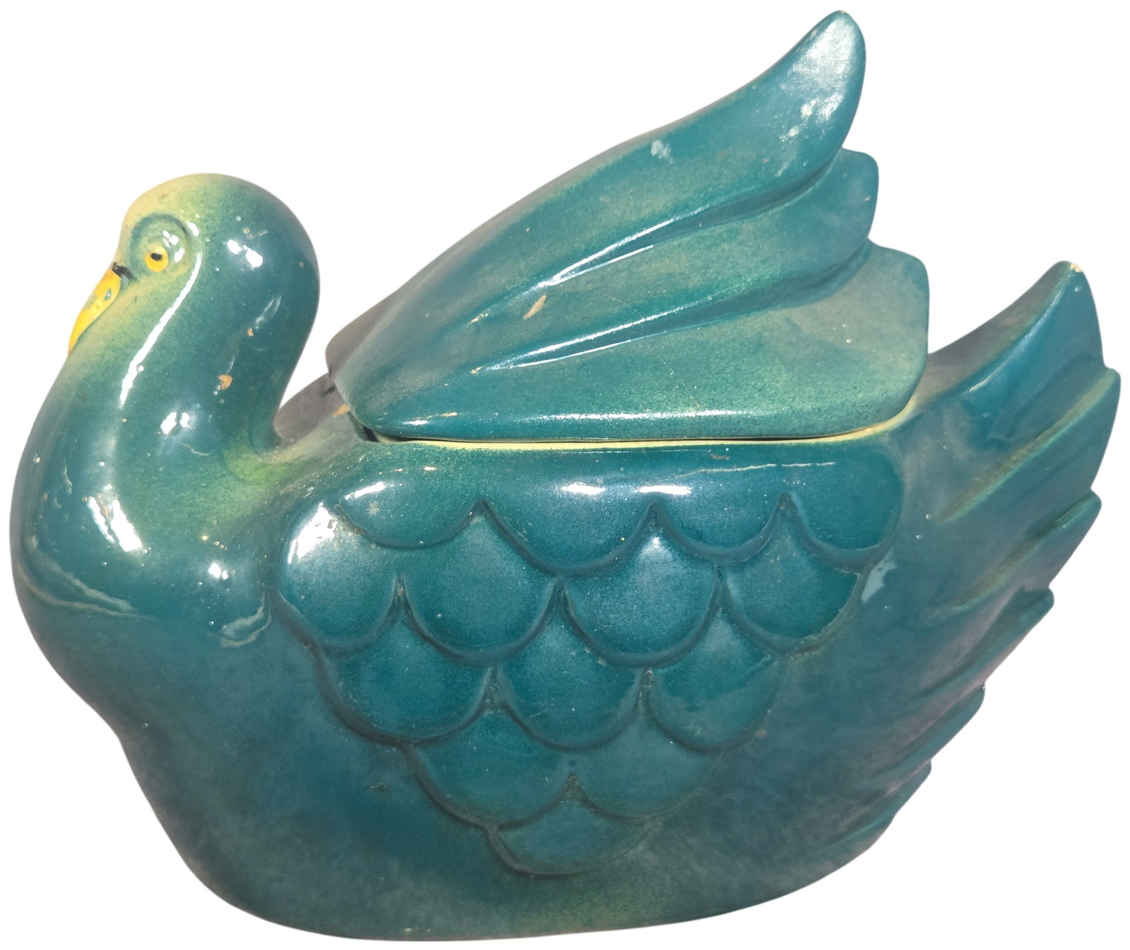 FAPCO USA Ceramic Dove Covered Jar: FAPCO Fredericksburg Art Pottery Co. glazed earthenware covered dish or jar in the form of a bird, frequently identified as a dove or pigeon. The bird is depicted in a resting pose with its head turne