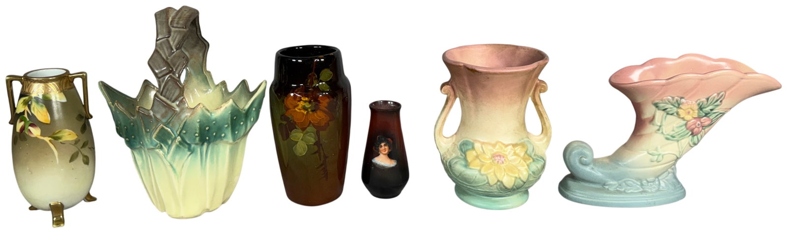 An Assortment of Decorative Ceramic Vases and Vessels including Hull Art Pottery: This collection consists of several decorative ceramic items representing various styles including Hull Art Pottery, hand-painted porcelain, and relief-molded earthenware. The group features a Hull Ar