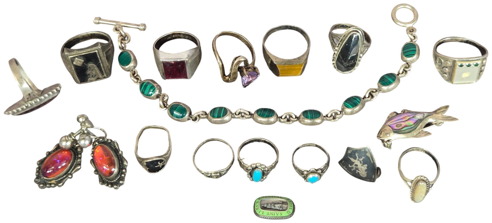 A Collection of Vintage Sterling Silver and Multi-Stone Jewelry including Taxco and Mexican Pieces: An assortment of sterling silver jewelry featuring a variety of bezel-set stones and materials. The collection includes a link bracelet with oval links set with what appears to be malachite cabochons 