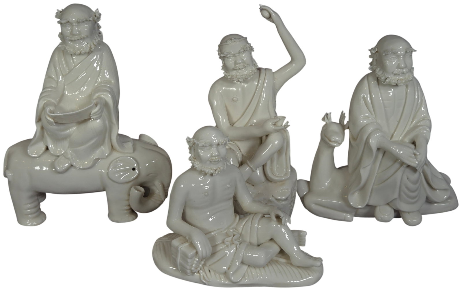 A Set of Four Chinese Blanc de Chine Dehua Porcelain Arhat Figurines (1 of 19)