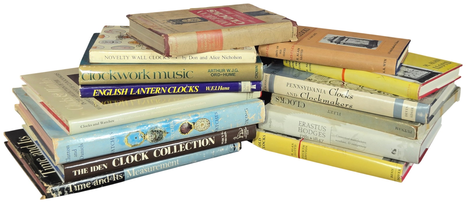 A Collection of Horological Reference Books including Eckhardt, Pennsylvania Clocks (Signed) (DJ): A collection of hardcover reference volumes focused on the history, mechanics, and collection of clocks and watches. Featured titles include Pennsylvania Clocks and Clockmakers by George H. Eckhardt (
