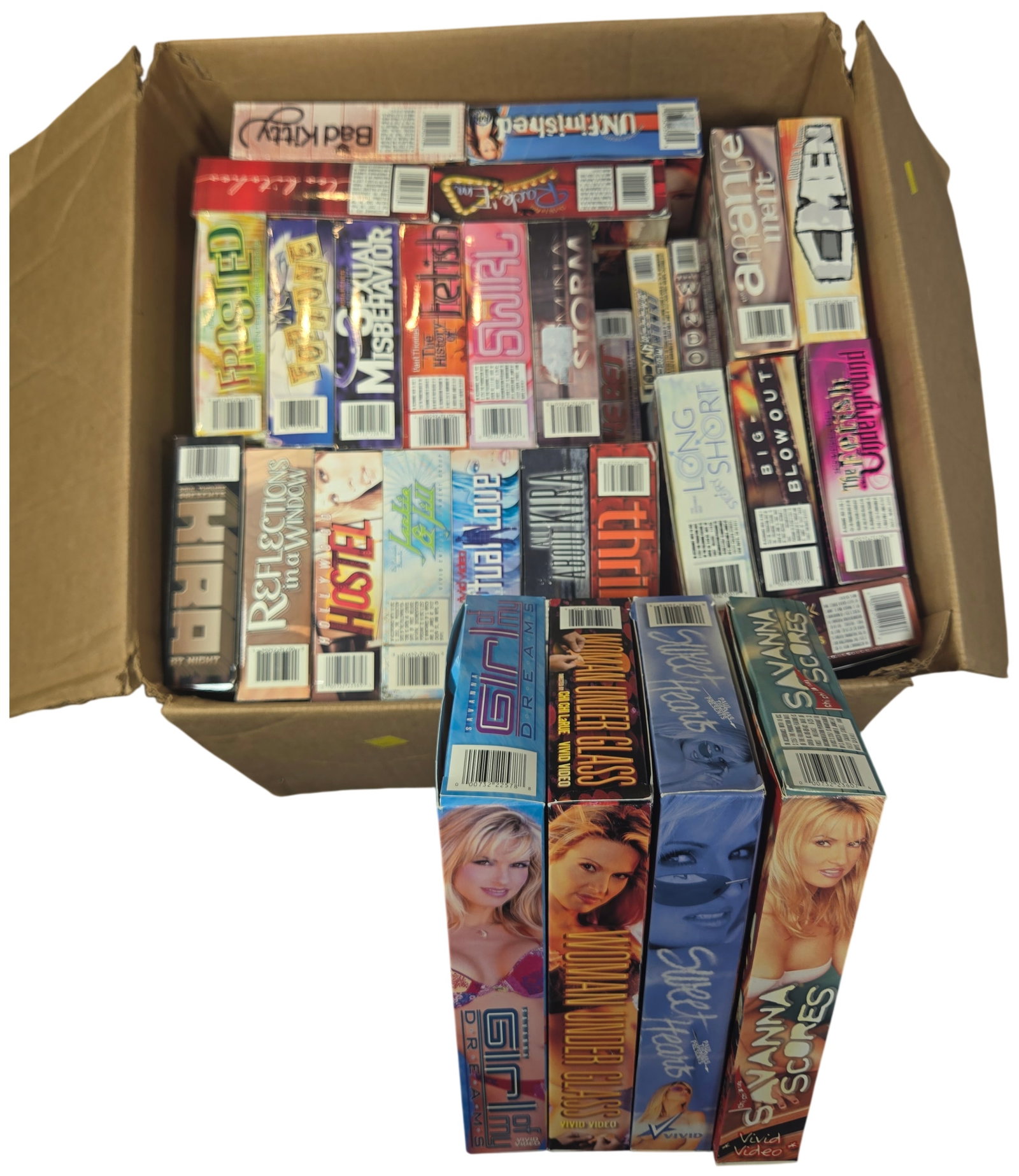 A Collection of Adult VHS Tapes Featuring Vivid Video and Star-Led Titles: This collection consists of a large assortment of adult erotic VHS tapes primarily dating from the late 1990s through the early 2000s. The lot features a significant representation from Vivid Video, a