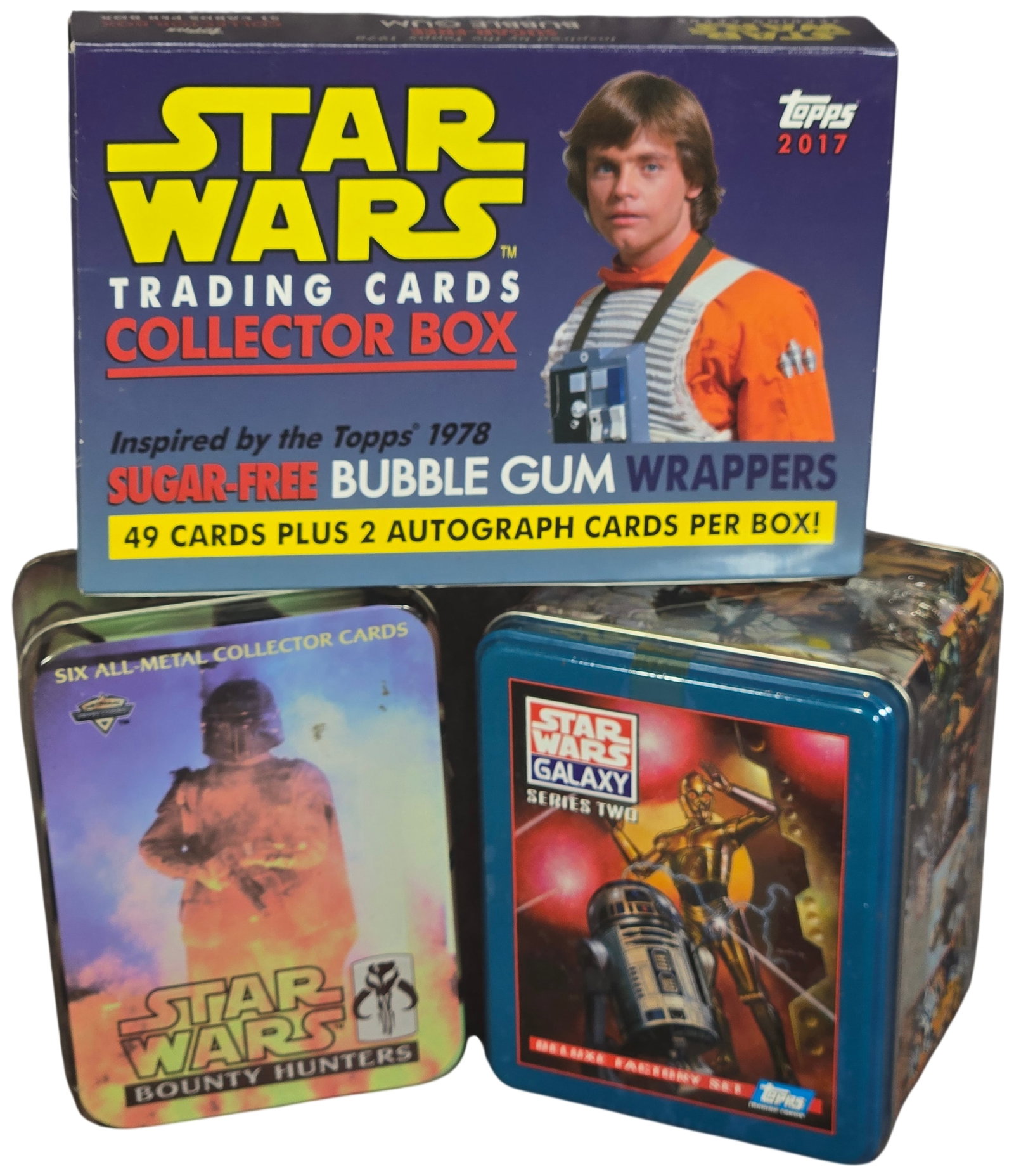 Three Star Wars Trading Card Sets Including 2017 Topps Sugar-Free Gum Collector Box and Two Factory: This lot comprises three distinct Star Wars trading card collections from Topps and Metallic Impressions. The first item is a 2017 Topps Star Wars Trading Cards Collector Box, designed as a tribute to