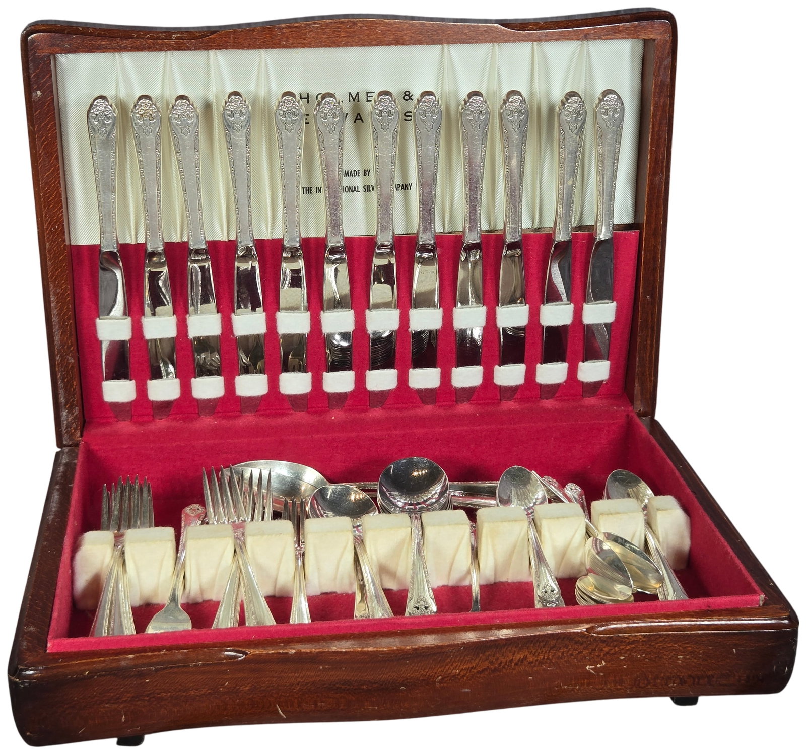 Holmes and Edwards Spring Garden Silverplate Flatware Service for Twelve with Storage Chest: A silverplate flatware service for twelve in the Spring Garden pattern by Holmes and Edwards, a division of the International Silver Company. Introduced in 1954, this mid-century pattern features a fl