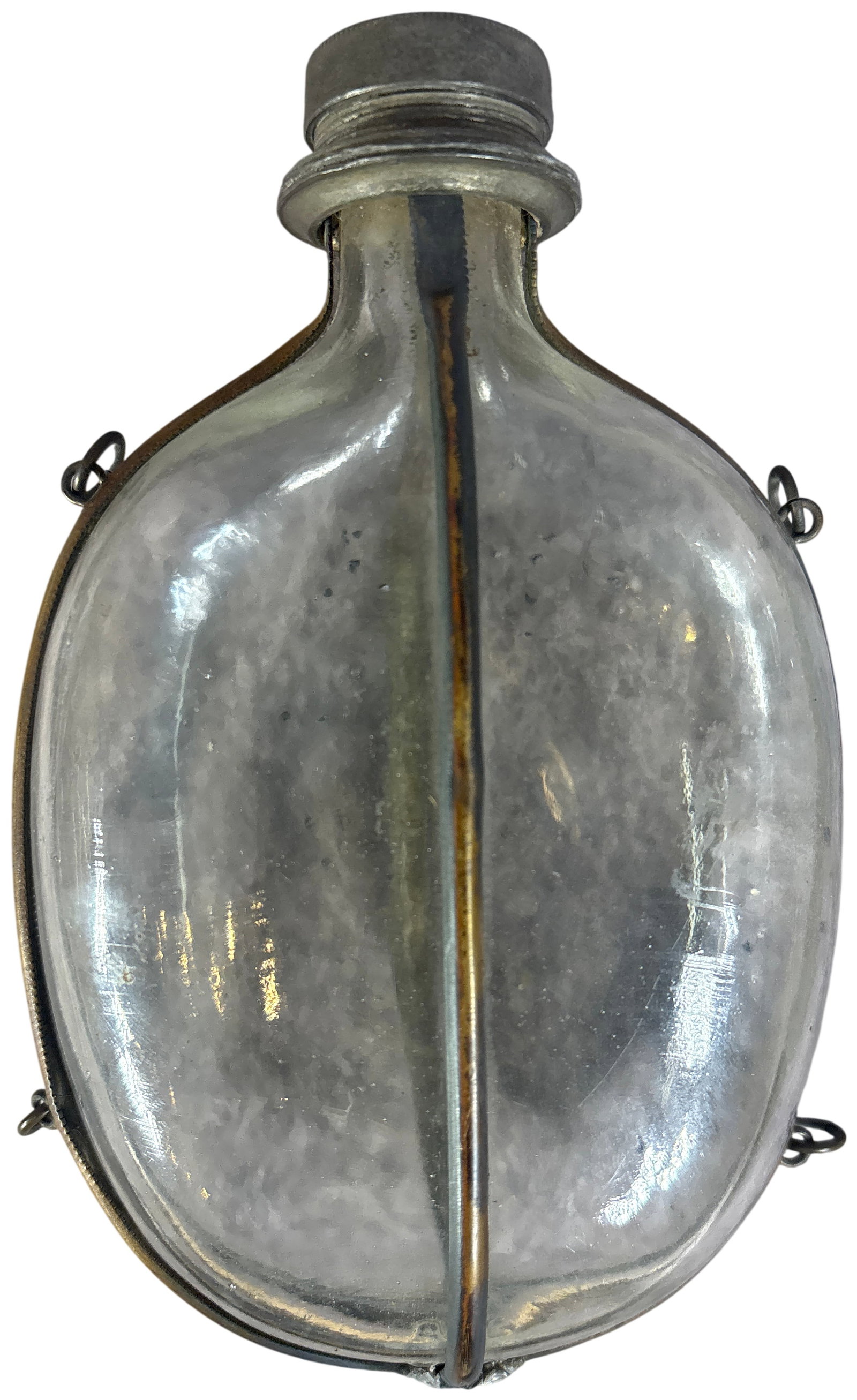Antique Glass and Metal Wire Cage Minnow Trap: An antique clear glass minnow trap featuring an oval-shaped body encased in a protective brass or bronze wire cage. The cage consists of two main straps joined by solder, forming a reinforced frame wi