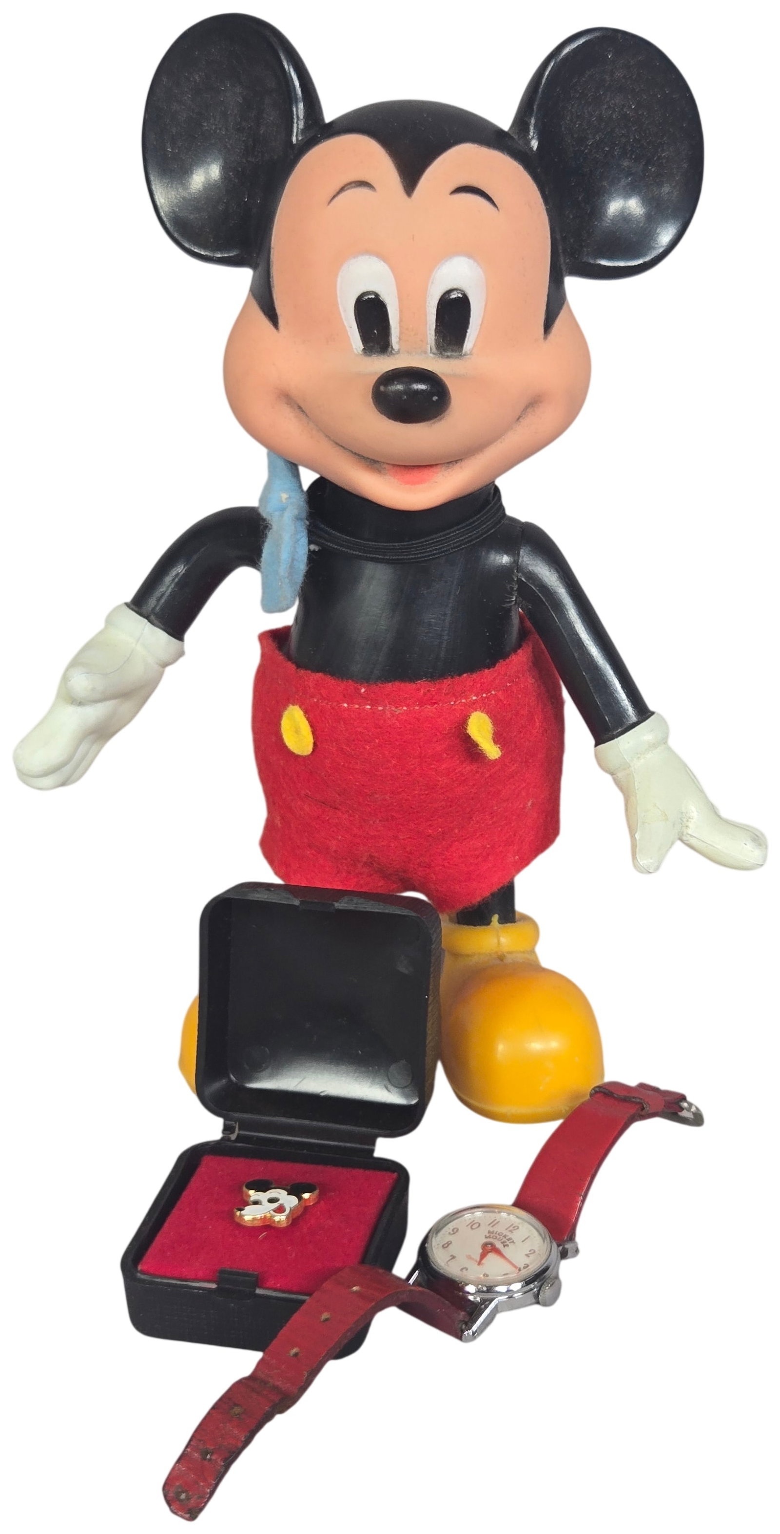 A Trio of Vintage Mickey Mouse Collectibles Including a Posable Figure and an Ingersoll Wristwatch: This lot features three vintage items depicting the character Mickey Mouse. The first item is a posable character figure produced by Walt Disney Productions. The figure is made of molded plastic with 