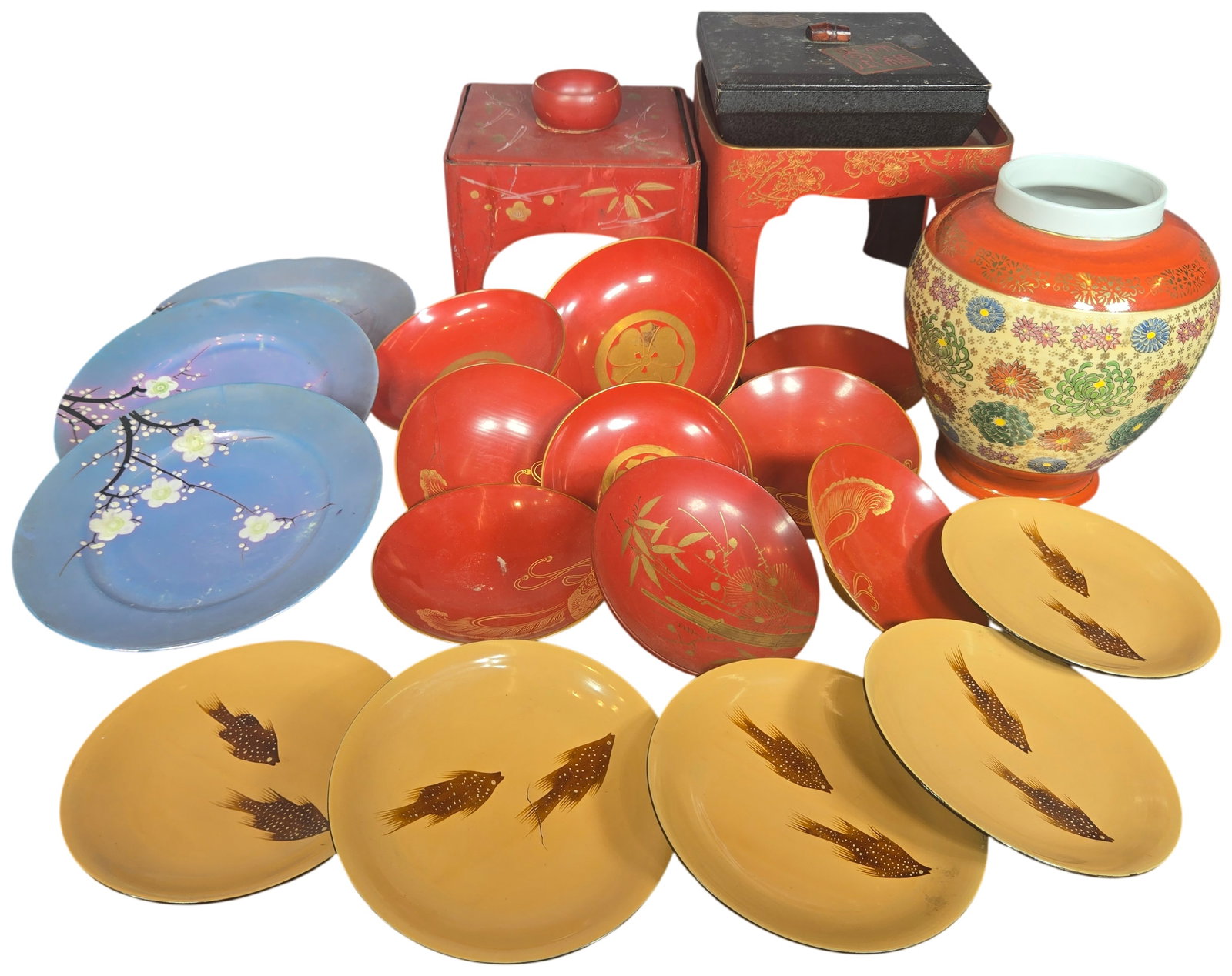 An Assortment of Japanese Decorative Arts Including Satsuma Style Porcelain and Urushida Ryukyu: This collection of Japanese decorative items features a variety of materials and traditional techniques from the 20th century. A large Satsuma style porcelain jar is decorated in the millefiori or tho