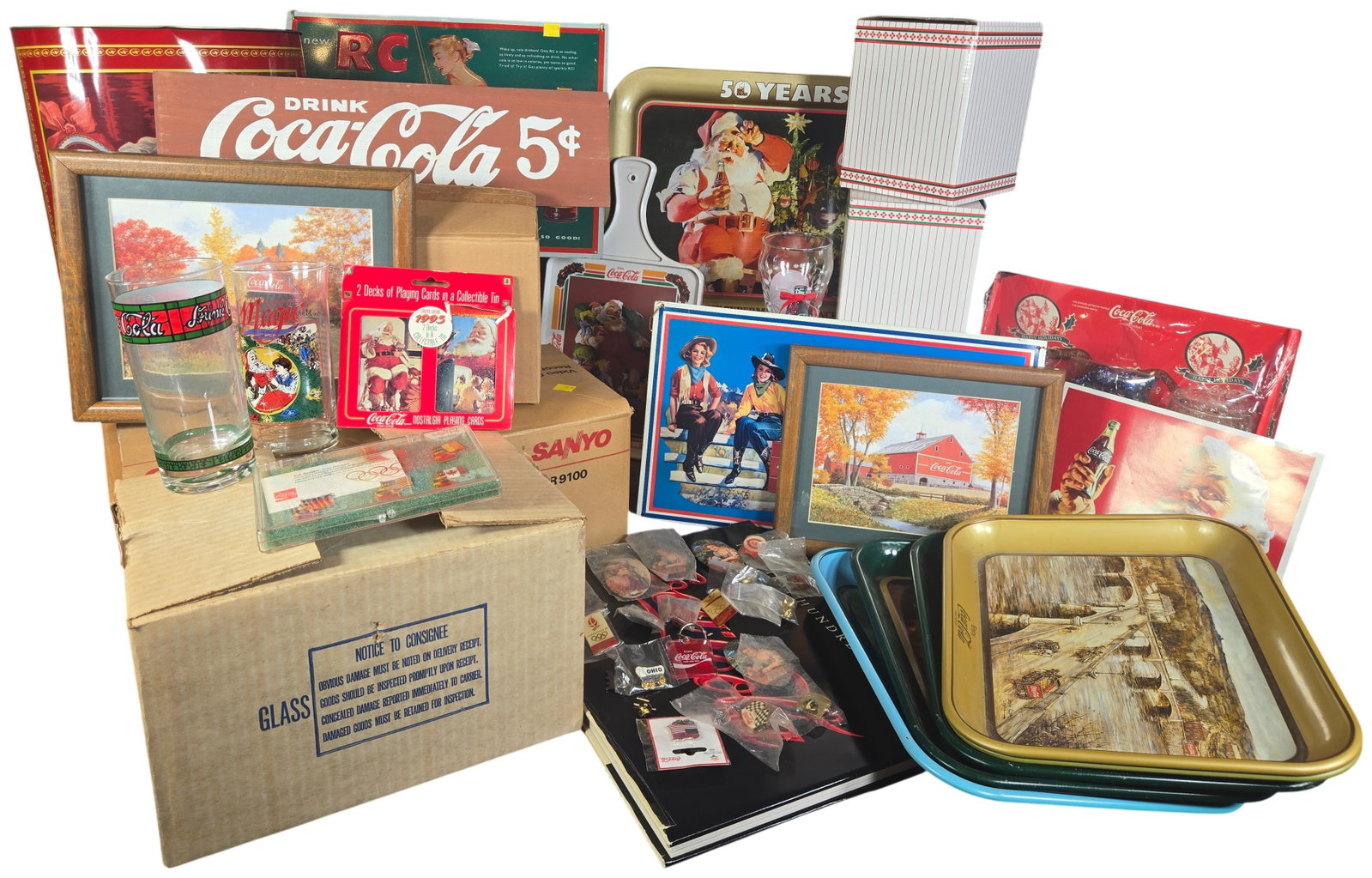A Collection of Coca-Cola, Dr Pepper, and RC Cola Advertising Memorabilia: A large collection of vintage and modern soda-related collectibles, primarily centered on the Coca-Cola brand with additional items from Dr Pepper and Royal Crown (RC) Cola. The lot features various a