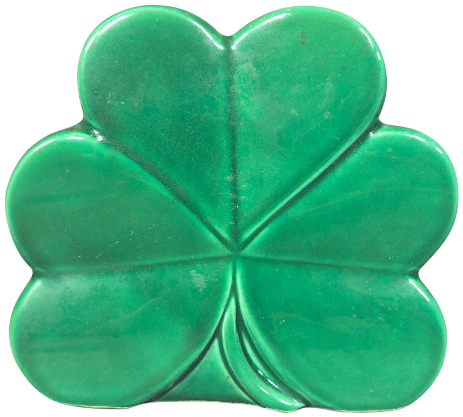 Parma by AAI Japanese Green Glazed Ceramic Shamrock Planter: A vintage ceramic planter produced by Parma by AAI in Japan. The vessel is designed in the figural shape of a three-leaf clover or shamrock, with a flat back and a hollow interior well. It is finished