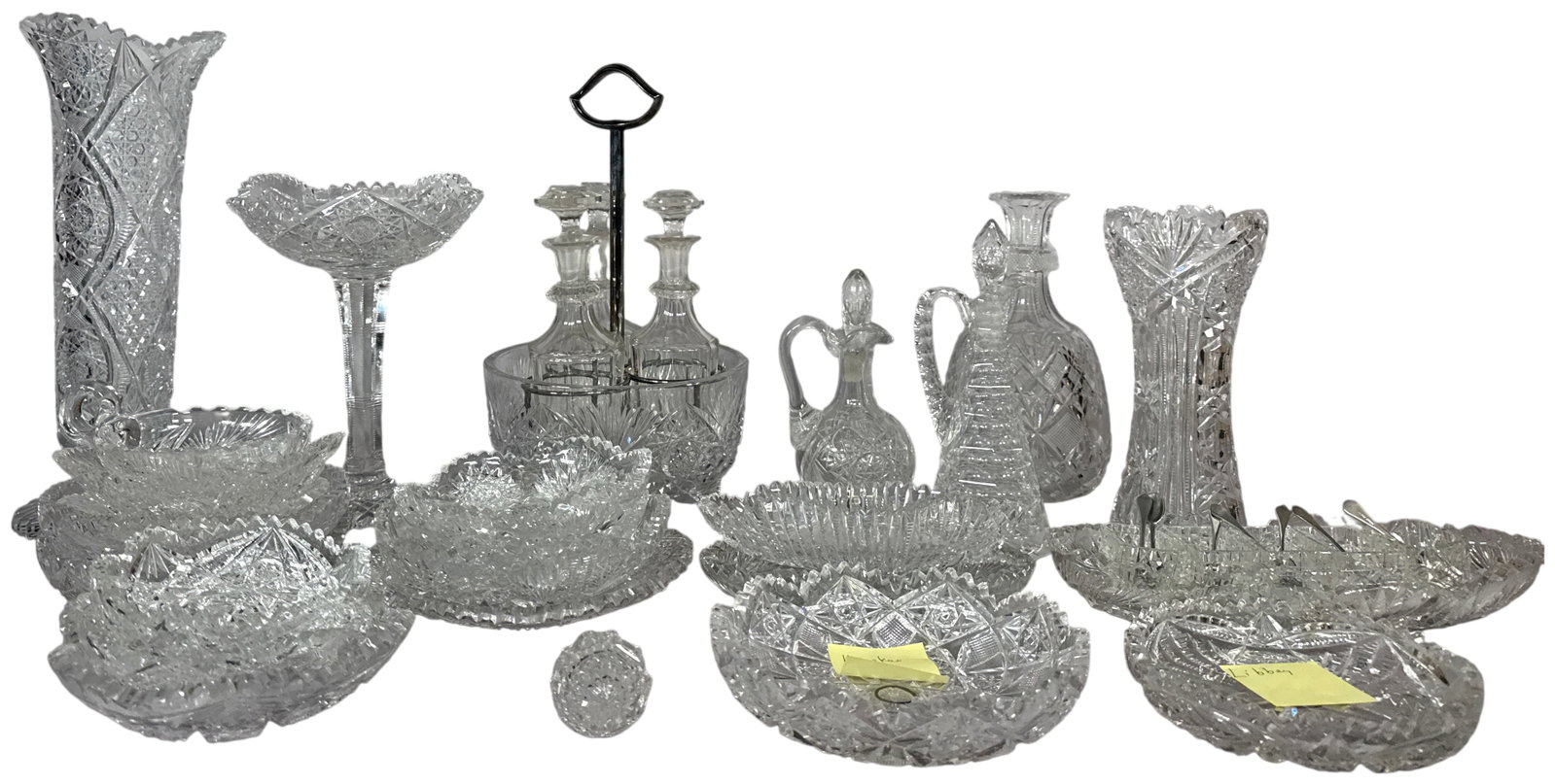 A Collection of American Brilliant Period Cut Glass Including Signed Hawkes and Libbey Pieces: An assortment of American Brilliant Period cut glass articles featuring high lead-content crystal with deep geometric miter cutting. The collection includes one round bowl with an etched Hawkes signat