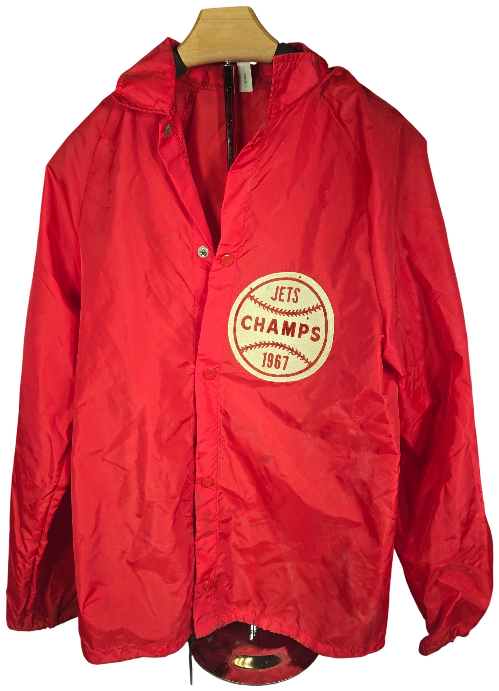 1967 Jets Baseball Champs Nylon Coach Jacket Sponsored by Wolfe Drugs: This is a vintage red nylon windbreaker coach's jacket manufactured by Nylon Fabricators, Inc. of West Haven, Connecticut. The garment features a full-length snap-button front closure, a pointed colla
