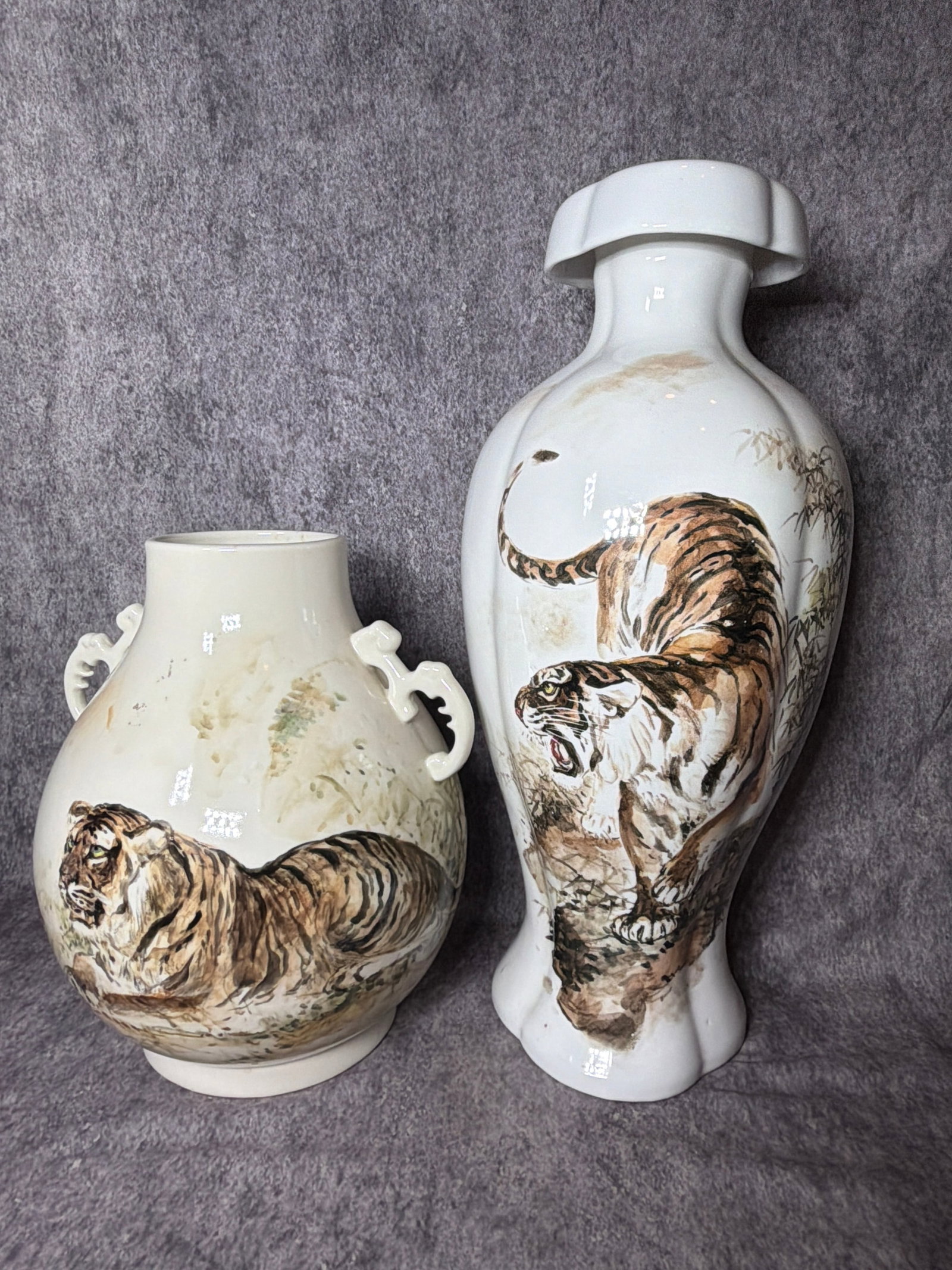 A Pair of Ming Village Singapore Year of the Tiger Porcelain Vases Hand Painted by Ong Boon Kong: Shipping is available on this lot. Pickup is Thursday, Oct. 8, from 11 am to 7 pm at the home in Akron, OH or we will provide in-house shipping for this item. We will charge a $10 fee to bring this lo