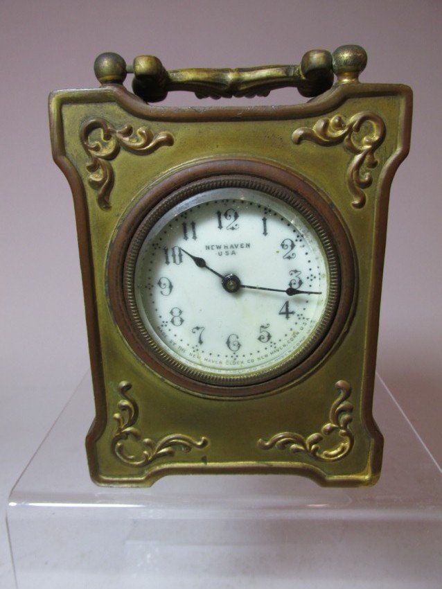 New Haven clock in metal case.: 4.75" tall. Shipping 12.50. We do combine shipping. To see how we combine shipping, please read our terms and conditions.