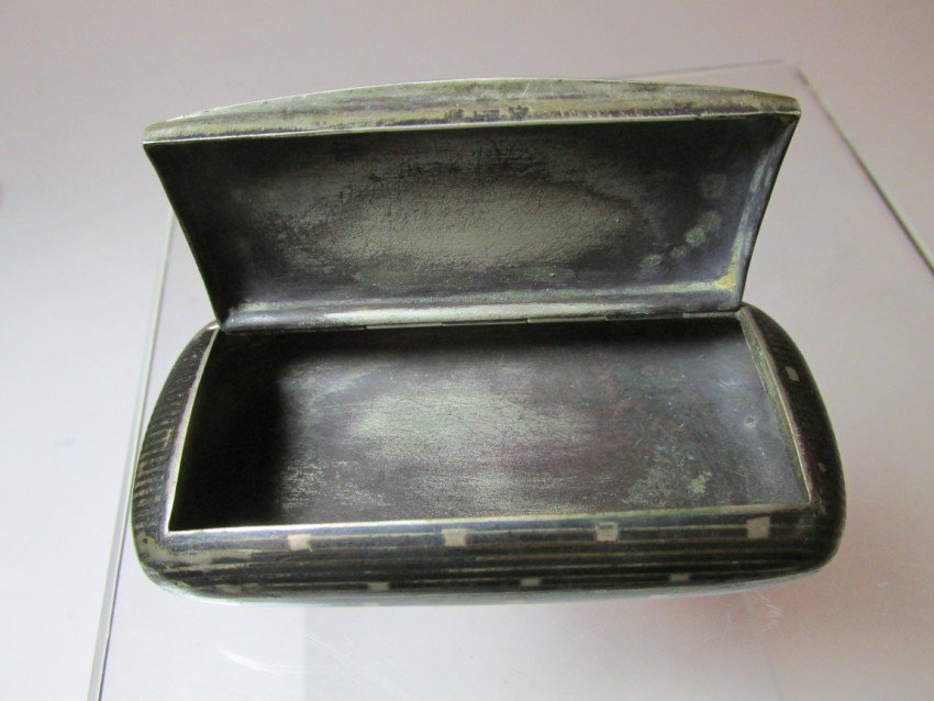 c. 1900 German Niello Silver Snuff Box: Marked 900 and with the Crescent and Crown German mark. A neat little box. Length: 3 1/8" long. Weight: 54.5 grams. Shipping 10. We do combine shipping. To see how we combine shipping, please read our