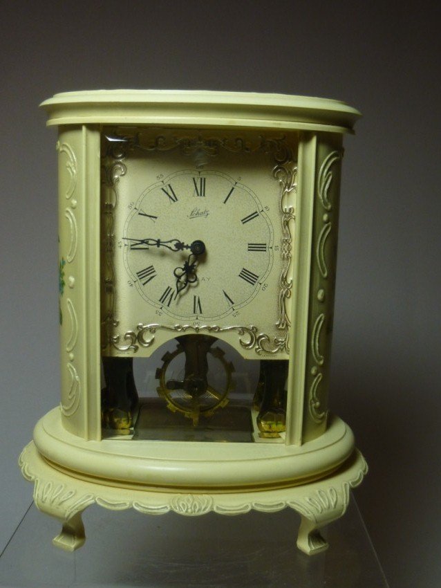 Vintage 8 day desk clock.: Schatz. Height: 6" Shipping 20.