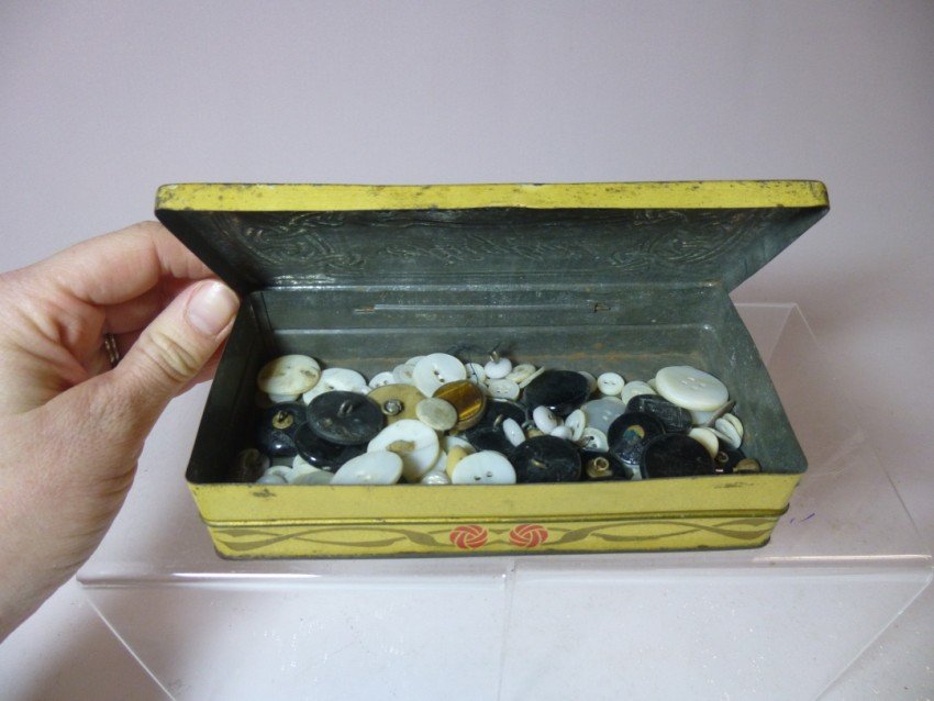 Antique Marshmallow tin full of buttons: 6.5" long. Shipping 10.