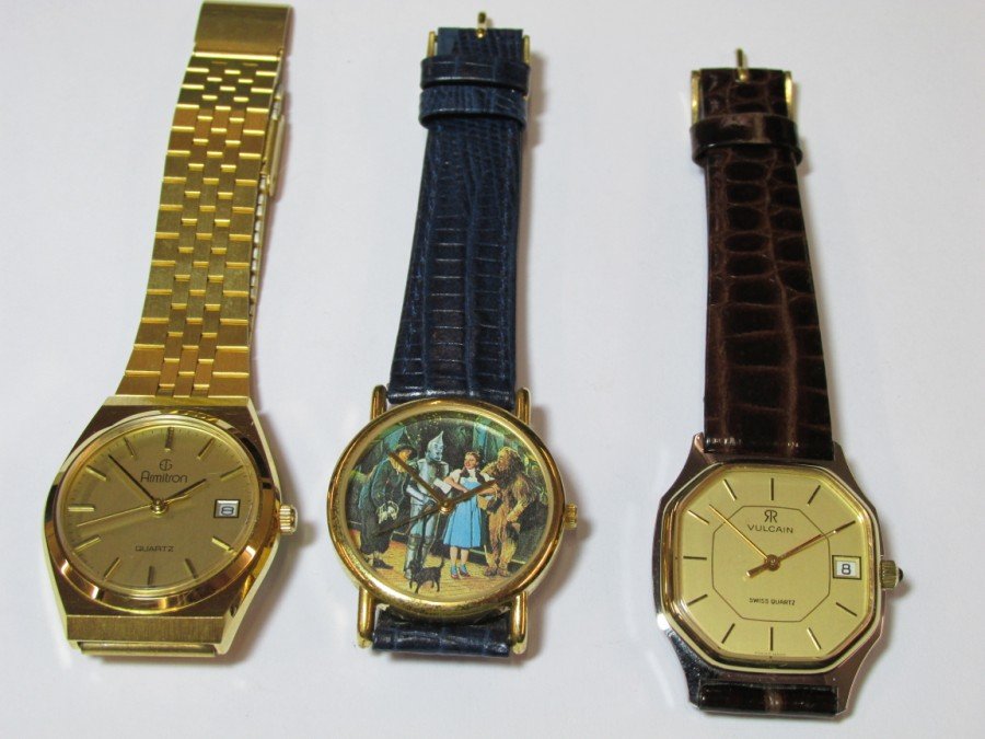 Group lot: 3 men's watches: Armitron, Wizard of Oz, Vulcain. Each is running. Shipping 7.50.