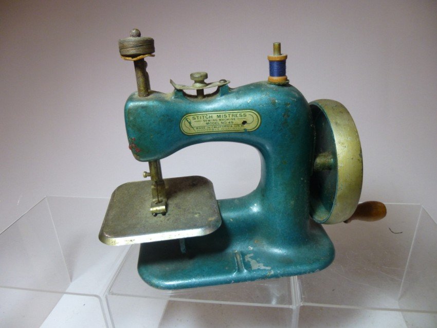 Stitch Mistress Toy Sewing Machine: Model 49. Height: 6.5" Shipping 20