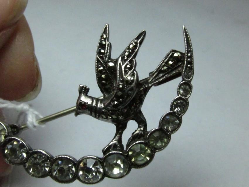 Fine Sterling Silver Bird Brooch: Signed Depose CF. Rhinestone, marcasite and red stone eyes. 1.5" high. Shipping 5.