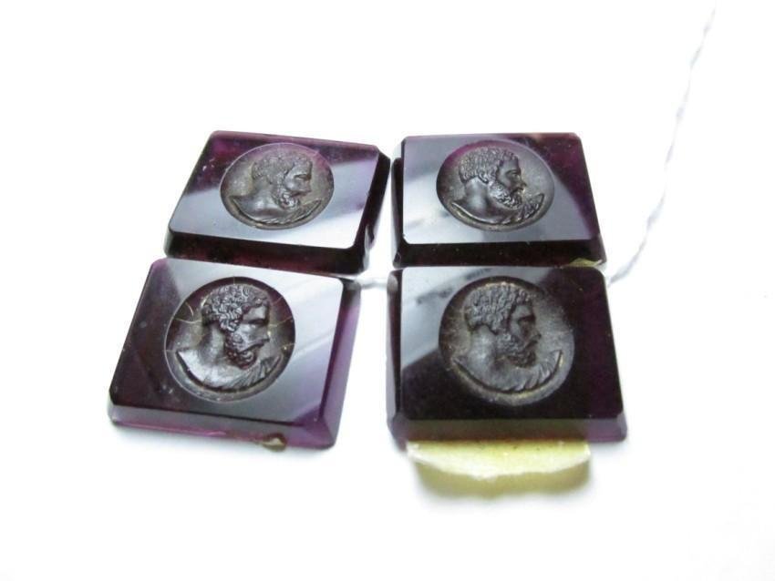 Four Purple Glass Antique Intaglio Pieces: Each is .75" x 1" and there are four. Shipping 4.