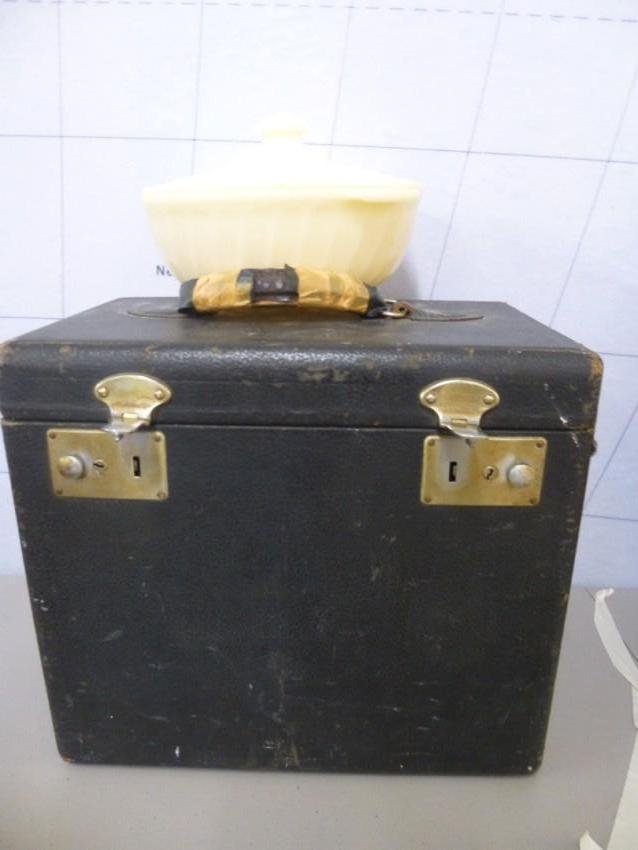 Singer Sewing Machine in Case: PLUS Covered dish. Buyers is responsible for pickup or shipping. We have a local UPS store that will ship nearly anything