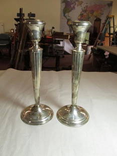 Pair of Sterling Silver Candlesticks: Weighted: Weight: 1 lb 13 standard ounces. Shipping 20