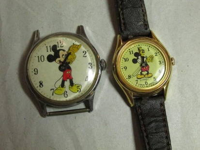 Two vintage Mickey Mouse watches: One is mechanical and running. The other probably needs a battery. Shipping 5.