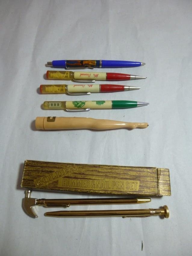 Advertising pen lot: Includes a nudie and 2 Mr. Peanut. Shipping 5