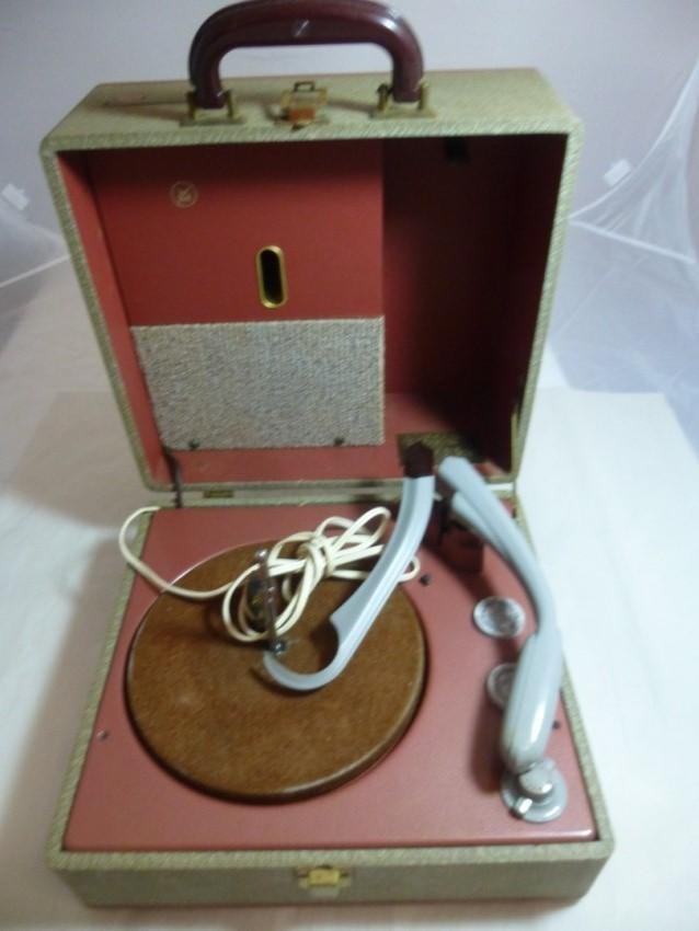 Vintage Portable Record Player: Buyer is responsible for pickup or shipping. We have a local UPS store that will ship nearly anything.