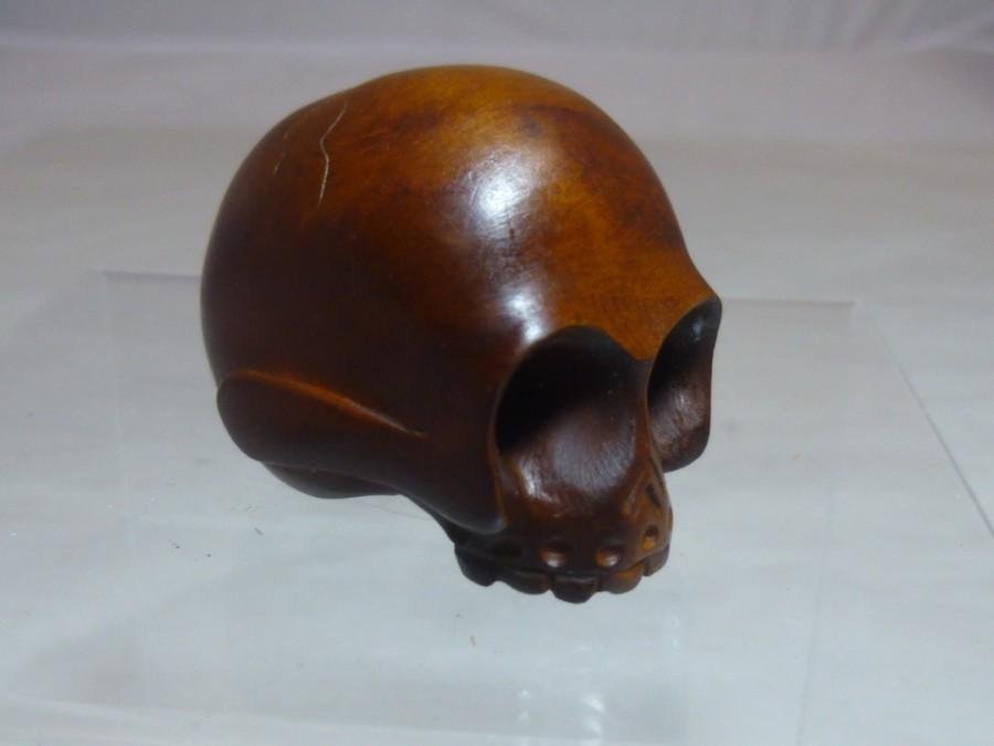 Unusual carved wooden skull netsuke: Height: 1 7/8" long. Shipping 7.50