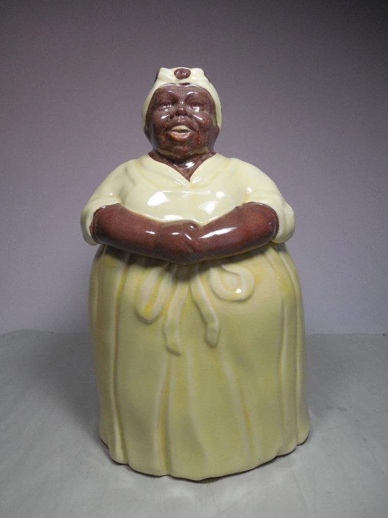 Black Americana Cookie Jar Mammy: Age hairlines visible on the bottom.See terms and conditions for shipping info.