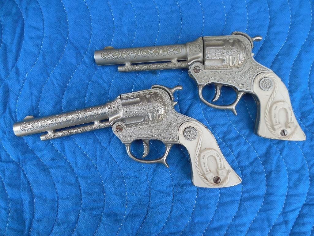 2 Vintage Toy Cap Guns: See terms and conditions for shipping details.