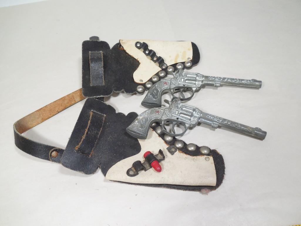 2 Toy Cowboy Guns PLUS Holsters: Shipping 17.50