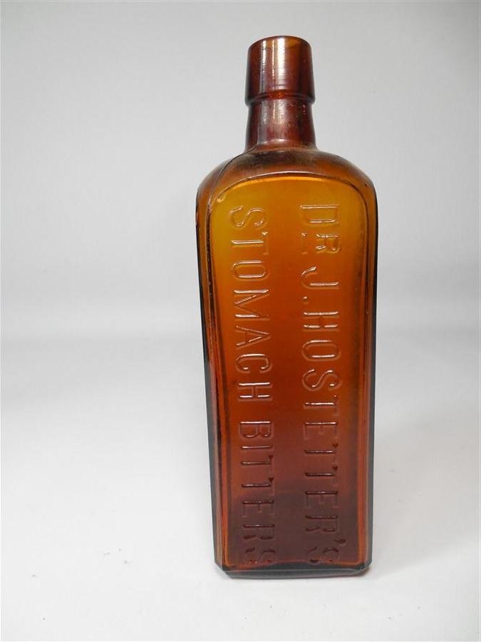 Antique Glass Bottle Amber Hostetter's Bitters: Antique Glass Bottle Amber Hostetter's Bitters