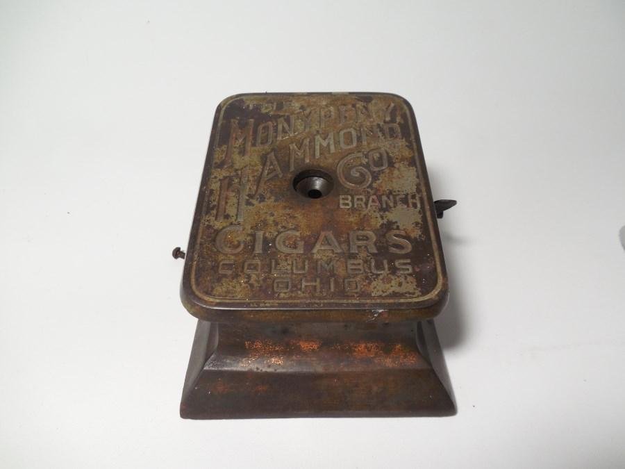 Clockwork Advertising Cigar Cutter Columbus Ohio: Working. We have the top off to show you the mechanics, and have the screws off so that you can reaffix the top. 