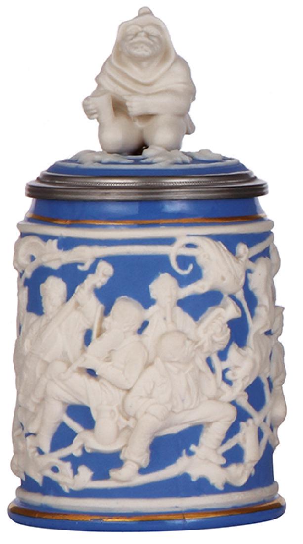 Mettlach stein, 485: Mettlach stein, .5L, 485, relief, earlyware, Parian, inlaid lid, factory firing flaw under base, otherwise mint