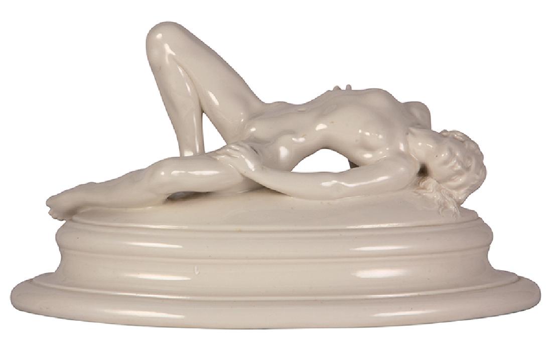 Porcelain nude woman erotic figurine: Porcelain nude woman erotic figurine, 8'' x 14.9'' x 9'', c.1900, marked 3002 N. 11. and manufacturers mark, reclining woman on pedestal, excellent quality, very good condition