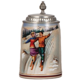 Stoneware stein, man & woman skiing