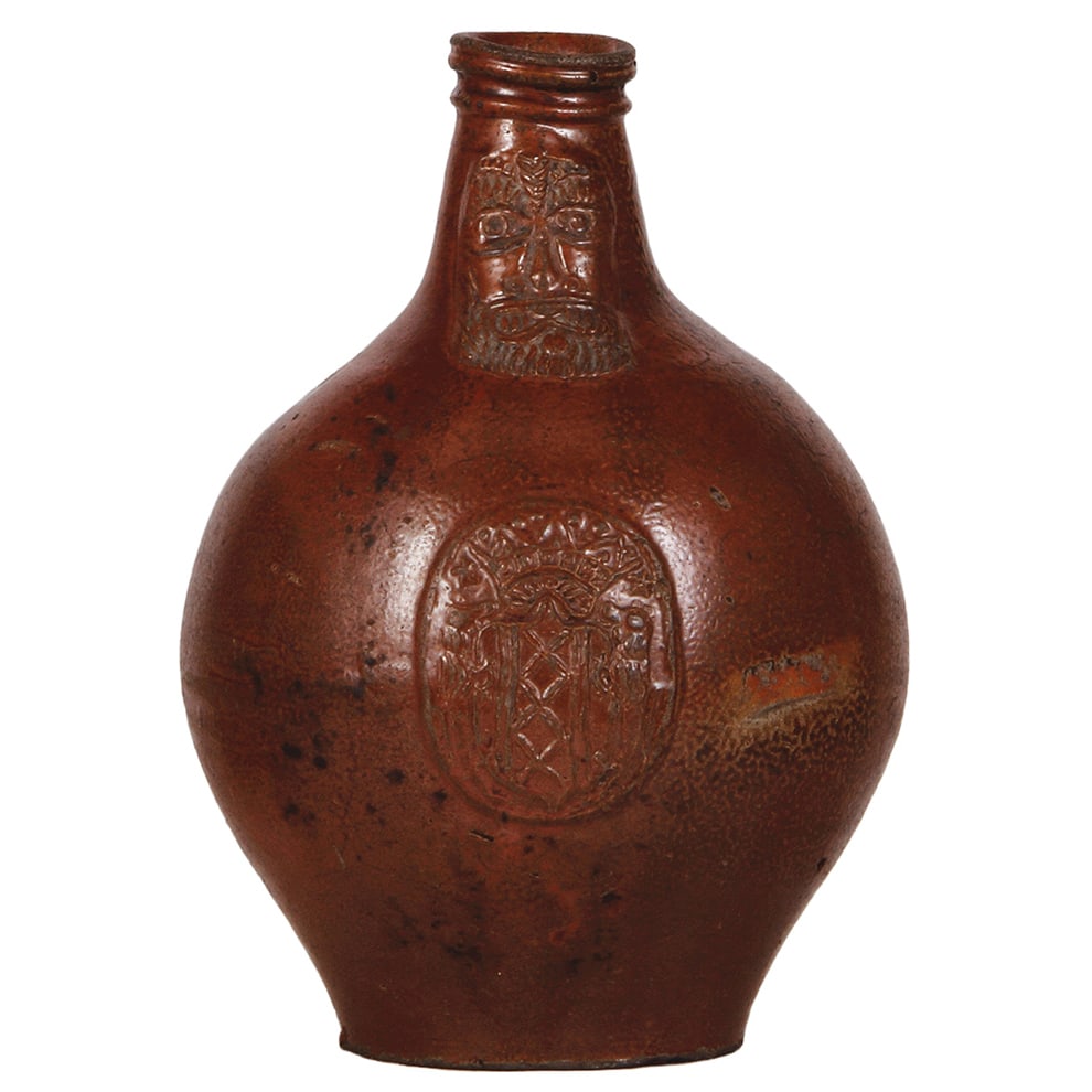 Bartmannskrug, Frechen, early 1600s,: Bartmannskrug, 11.2" ht., Frechen, early 1600s, brown glaze, relief coat-of-arms, some minor flakes and scratches, good condition. 