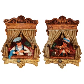Pair terra cotta plaques, The Puppet Show