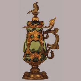 Brass stein, green blown glass with brass overlay