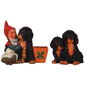 Terra cotta figurines (two), dwarf & Rottweiler; two Dachshunds