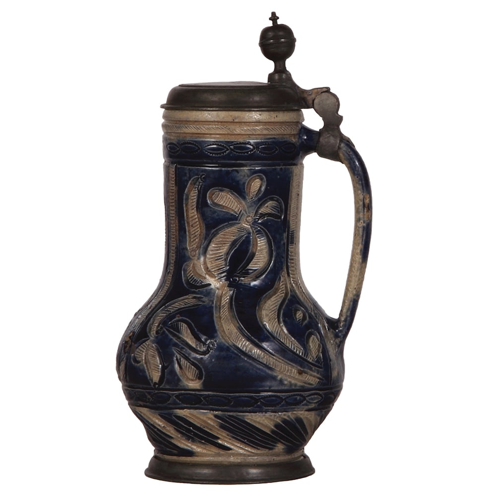 Muskauer Birnkrug, 10.5'' ht., early 1700s : Muskauer Birnkrug, 10.5'' ht., early 1700s, incised, blue saltglaze, pewter lid and footring, good repair of the pewter strap, body has a small chip and a few glaze flakes.