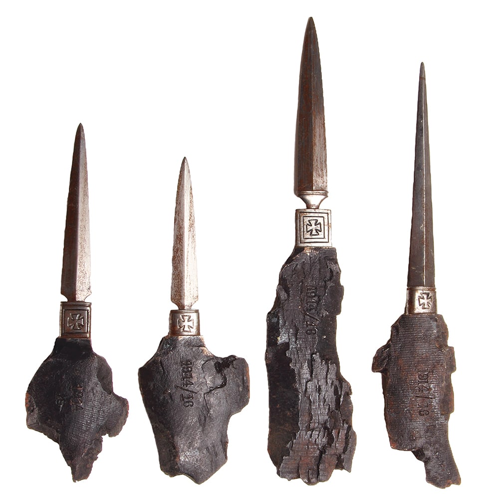 Trench Art Knives, four, 6" to 8.5", metal shrapnel, dated 1914 - 1916: Trench Art Knives, four, 6" to 8.5", metal shrapnel ground into blades, dated 1914 - 1916, Iron Cross below blade, good condition.