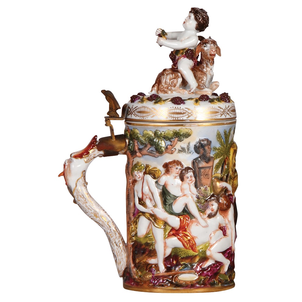 Porcelain Capo-di-Monte stein, 1.0L : Porcelain Capo-di-Monte stein, 1.0L, 11.2" ht., relief & hand-painted, elaborate festive scene with men & women, porcelain lid with boy and goat, one antler missing, otherwise mint.