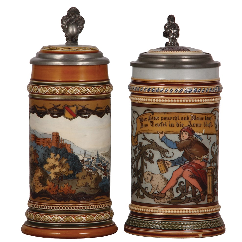 Mettlach steins, two, .5L, 1675, Heidelberg : Mettlach steins, two, .5L, 1675, etched, Heidelberg, 500 year Jubiläumsfeier under handle, mint; with, .5L, 1947, etched, inlaid lid, mint.