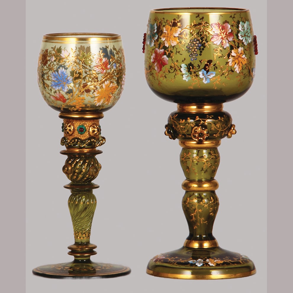 Bohemian wine glasses, two, 7.7" ht.: Bohemian wine glasses, two, 7.7" ht., blown, amber, applied glass prunts & color balls, hand-painted, floral, ribbed base, gilding; with, 8.5" ht., blown, amber, glass prunts, blue & red glass balls t