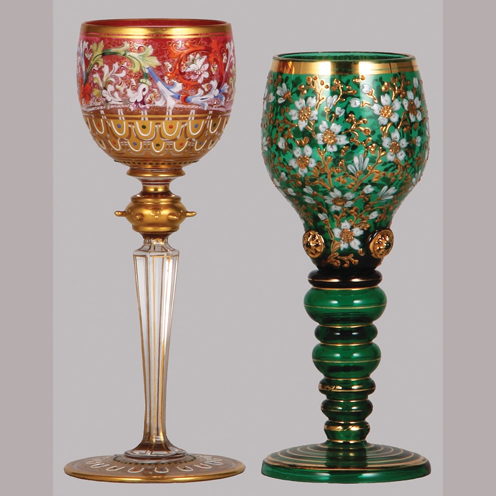 Bohemian wine glasses, two, 7.7" ht. & 7.2" ht.: Bohemian wine glasses, two, 7.7" ht., blown, pink to clear, applied glass prunts, hand-painted, floral, gilding; with, 7.2" ht., blown, green, applied glass prunts, hand-painted, floral, gilded, both 