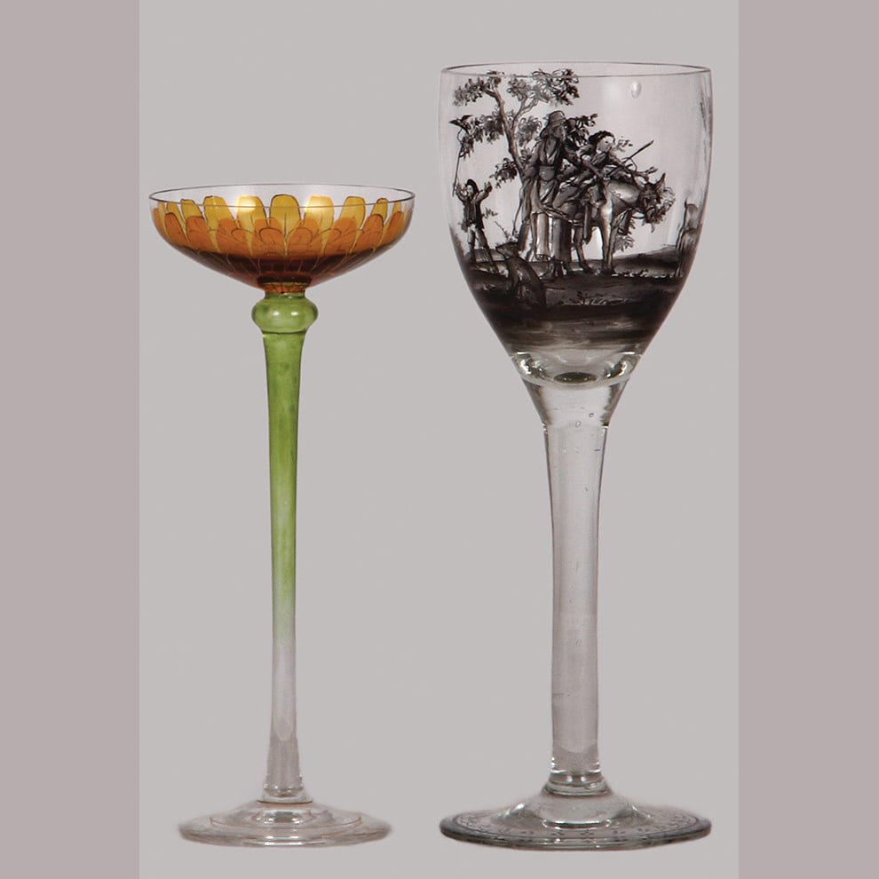 Bohemian wine glasses, two, 6.3" ht. & 7.6" ht.: Bohemian wine glasses, two, 6.3" ht., blown, clear to pale green, transparent hand-painted yellow petal bowl; with, 7.6" ht., blown, clear, hand-painted, Schwarzlotmalerei graphic style decorating, pe